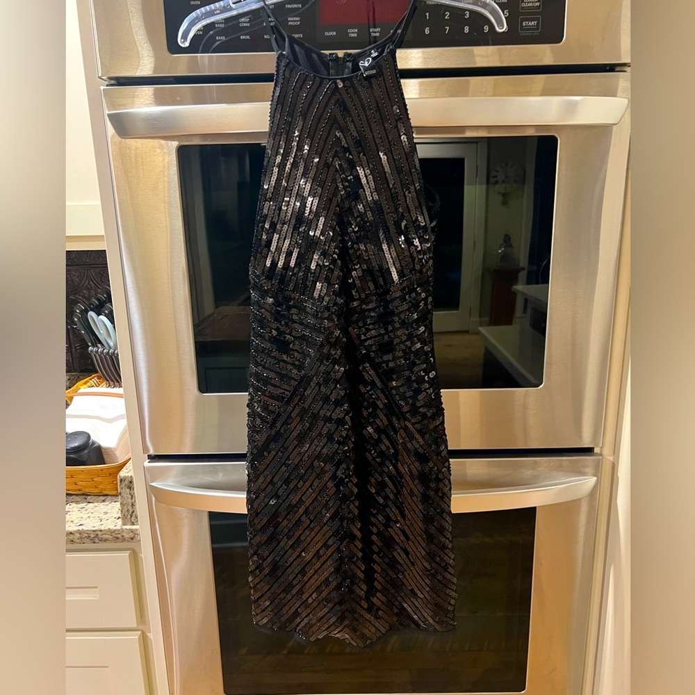 Like new black dress from Windsor. Size small.